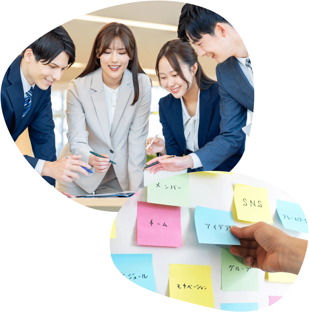 写真：４人の若い職員が企画会議をしている